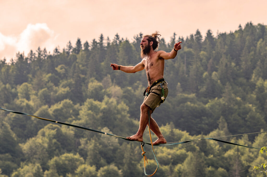 Man, tight rope walking.